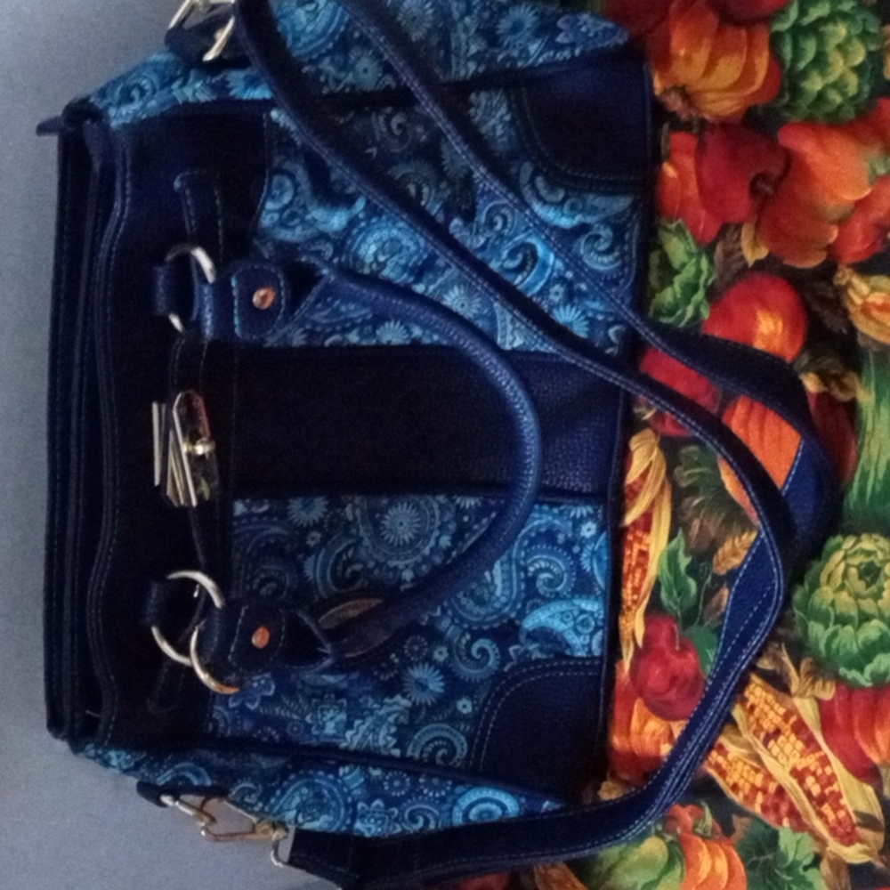 Simply Glamours purse. Blues and black trim